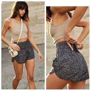 NEW Free People movement the way home leopard print Athletic Run shorts MED lulu